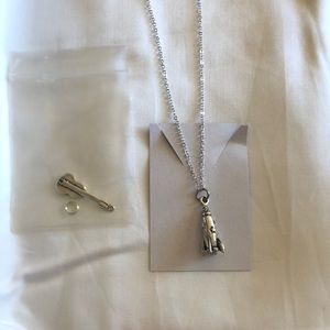 Silver 16inch necklace and two sterling silver charms.